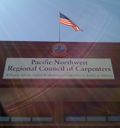 Thumbnail for File:PacificNWCarptersBuildingNowSignCentered.JPG