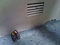 Thumbnail for File:ShoesOnTheStreet.JPG
